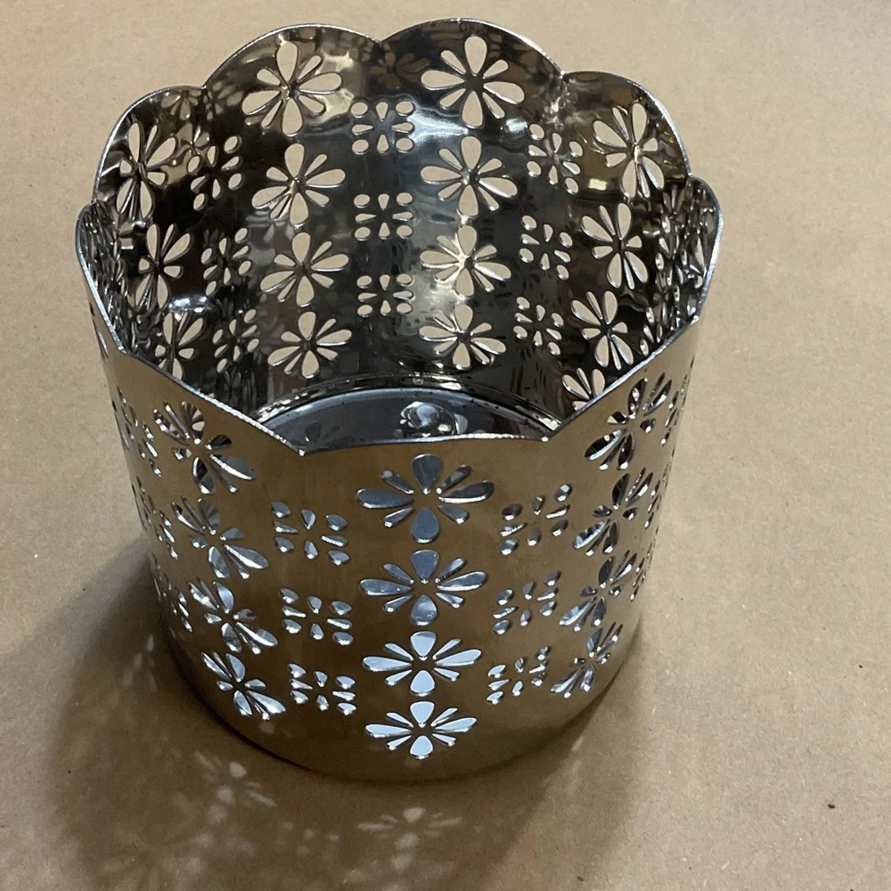 Elegant Silver Floral Cutout Candle Holder