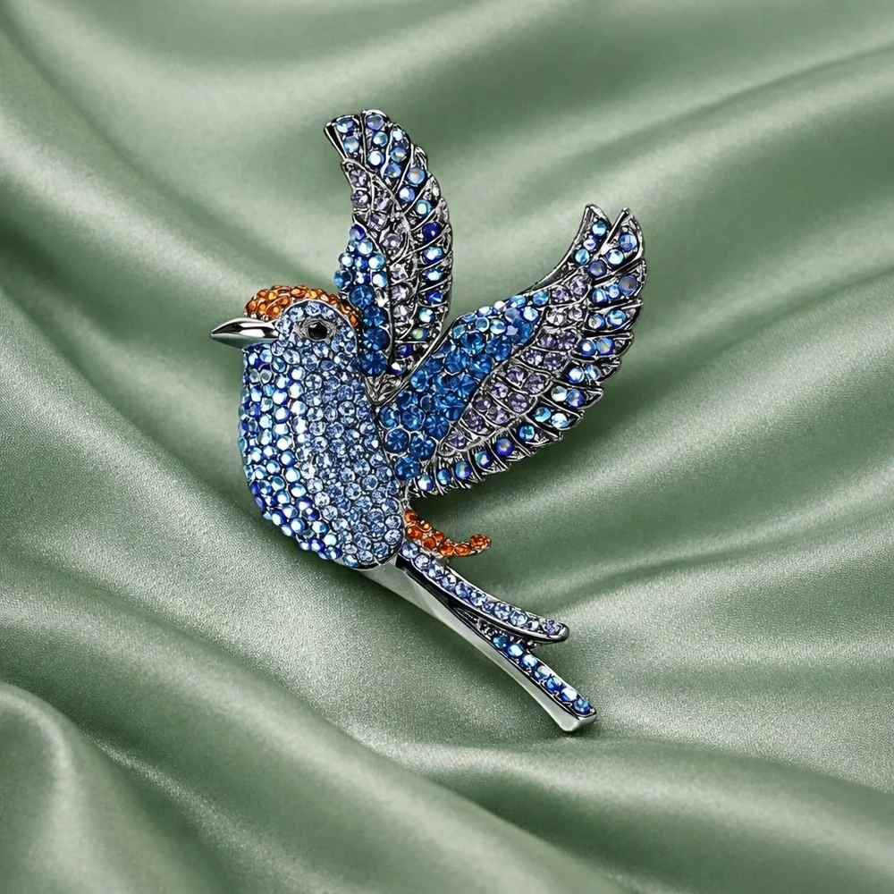 Anthropologie bird silver