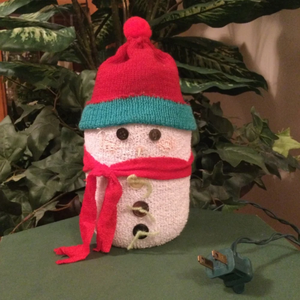 Handmade snowman lighted