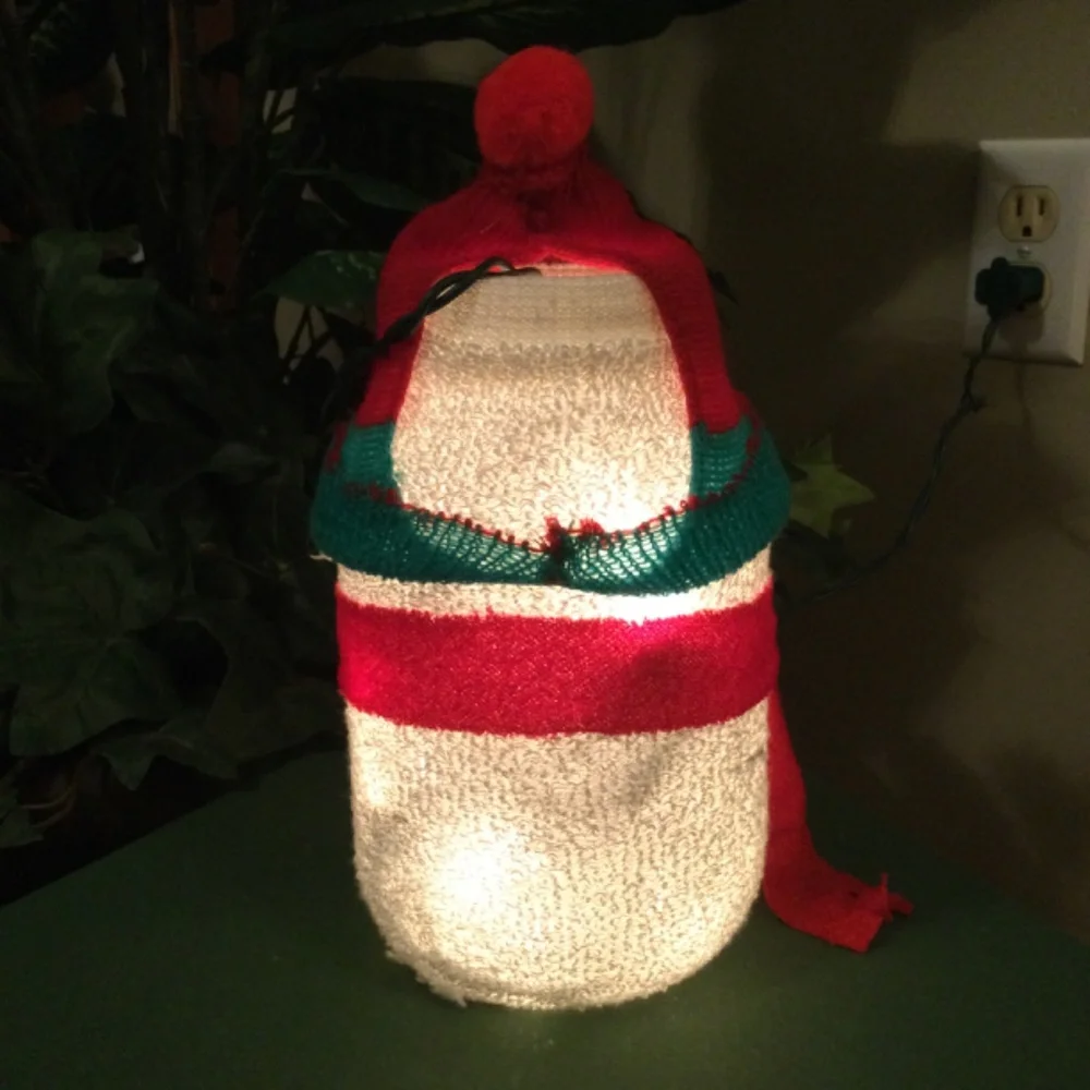 Handmade snowman lighted