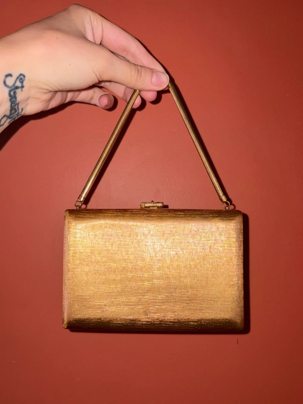 Antique Volupté gold handbag
