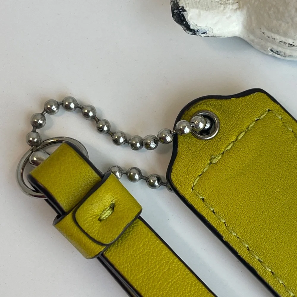 Coach hang bag charm