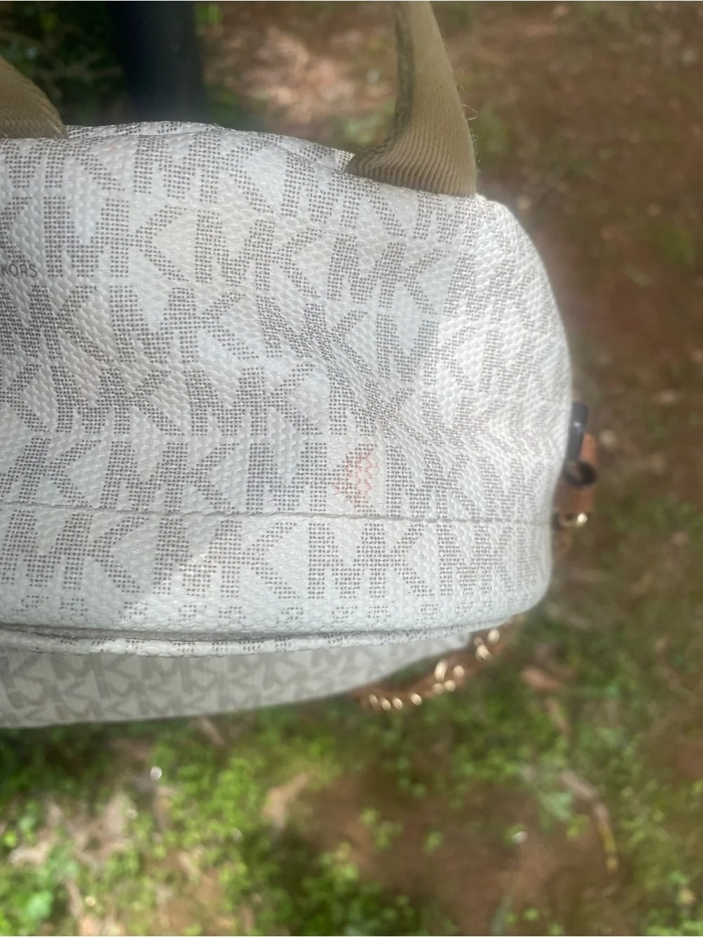 Michael Kors cream one smaller