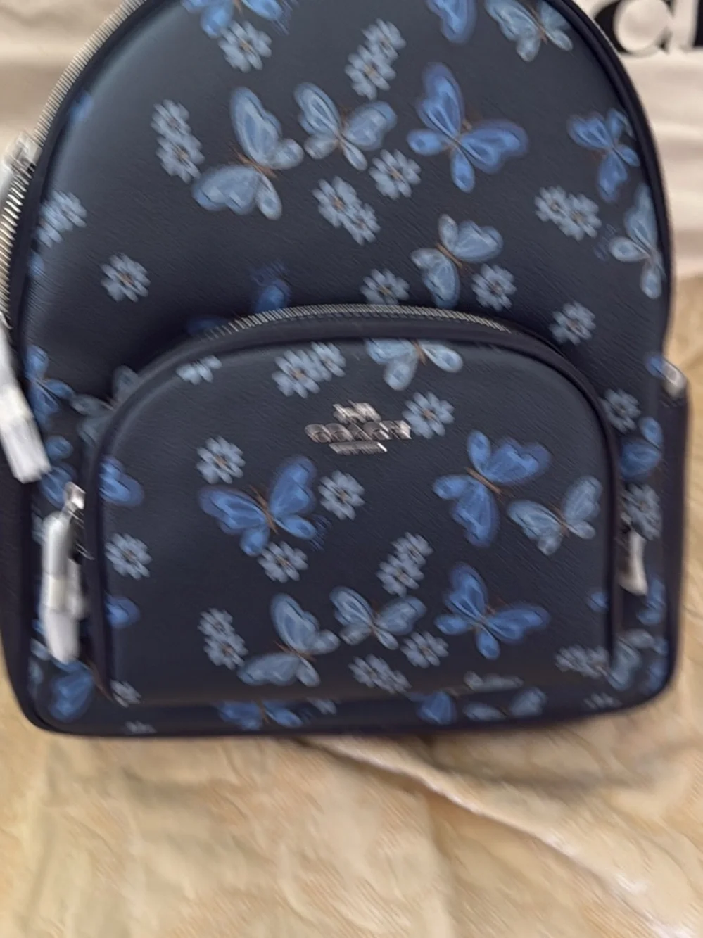 Coach logo adjustable pockets