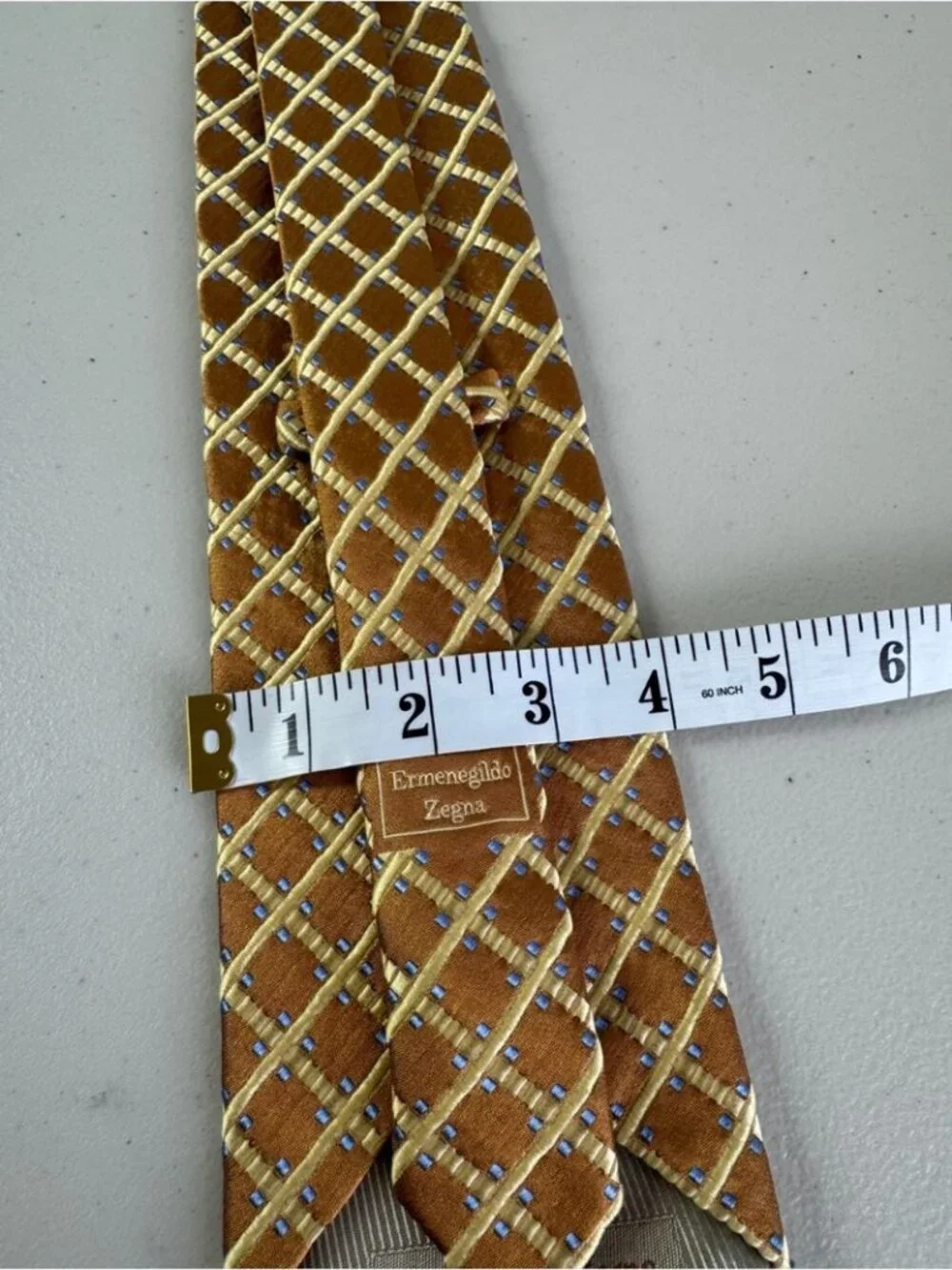 Ermenegildo Zegna bundles italian golden