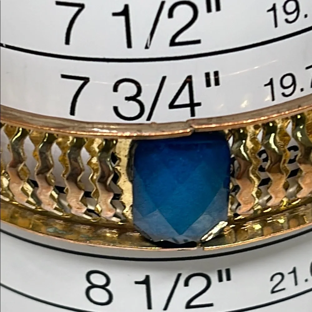 Goldtone and faceted Blue Bangle Bracelet