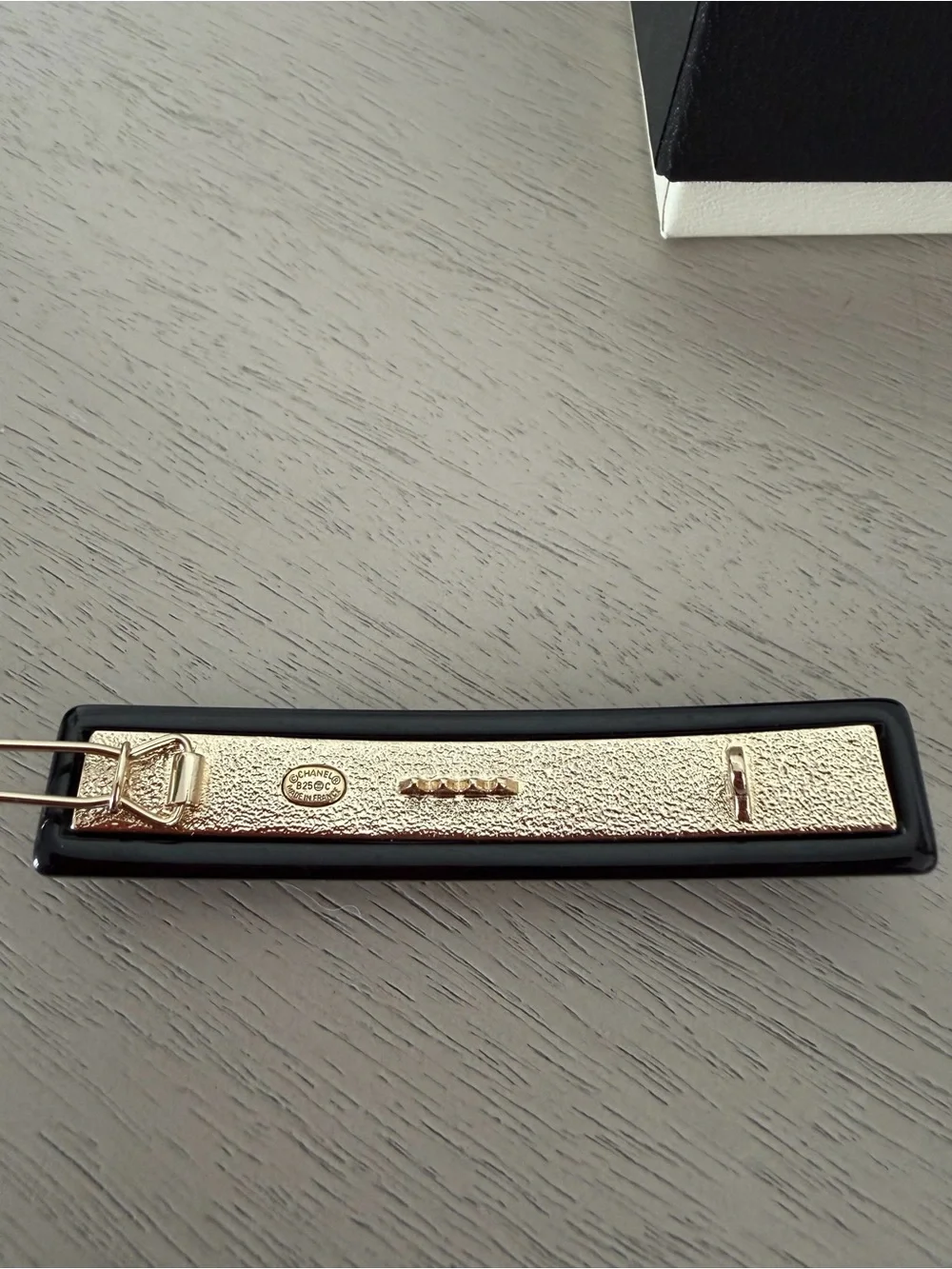 CHANEL Black Resin Hair Clip with Gold Crystal CC Logo
