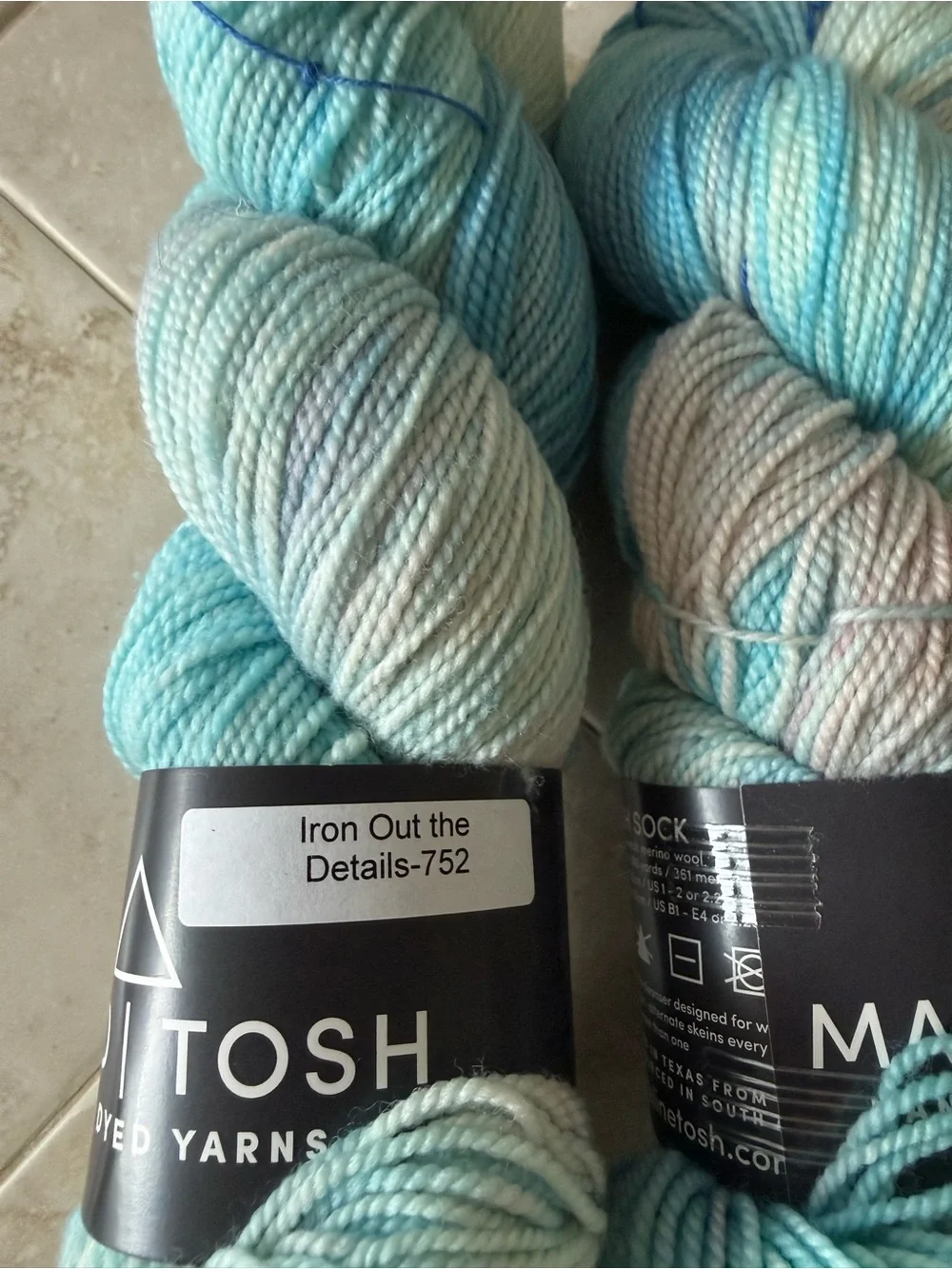Madelinetosh Hand-Dyed Yarn Skeins in Aqua and Pale Blue