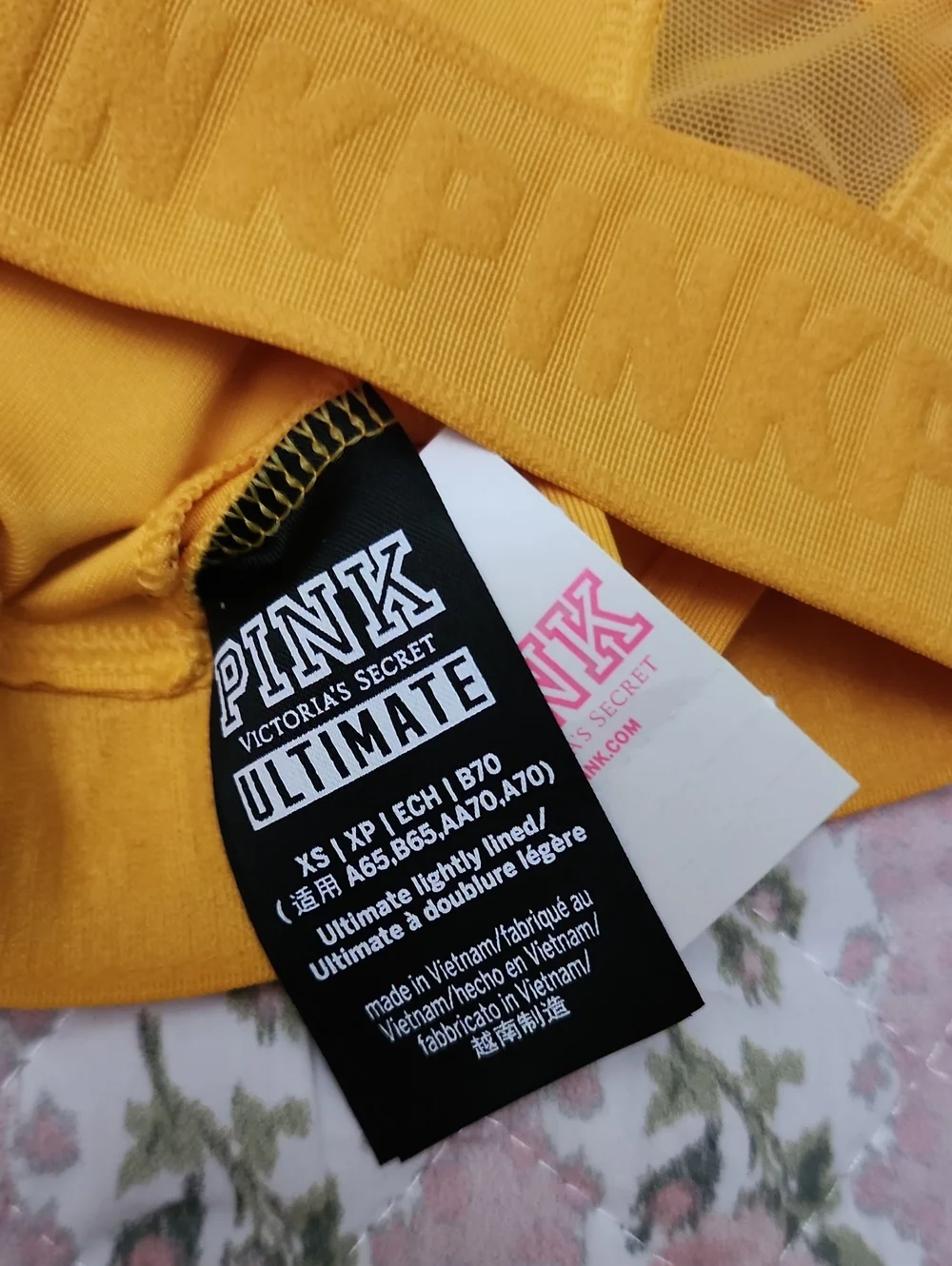 NWT PINK Ultimate Yellow Embossed Logo Crop Sports Bra XS XP