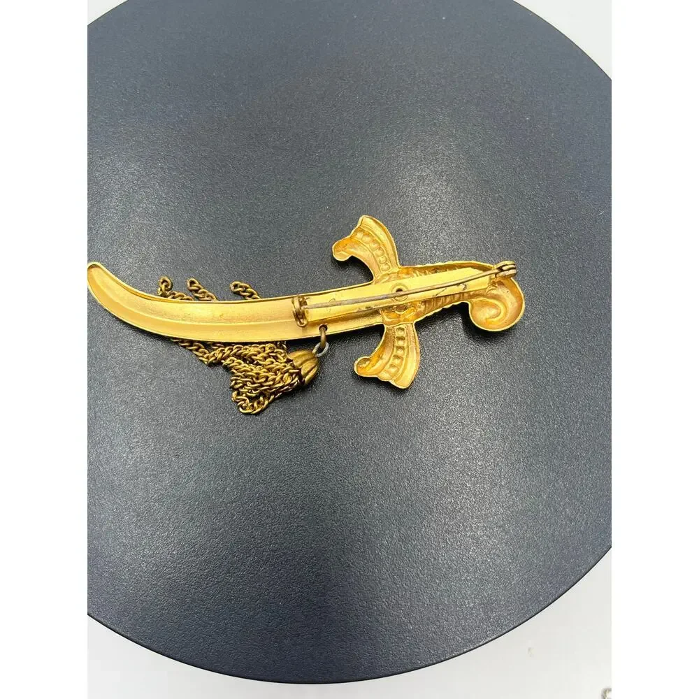 Coro Vintage Signed Gold‎ Tone Sword Dagger Brooch With Tassels and Green Stone