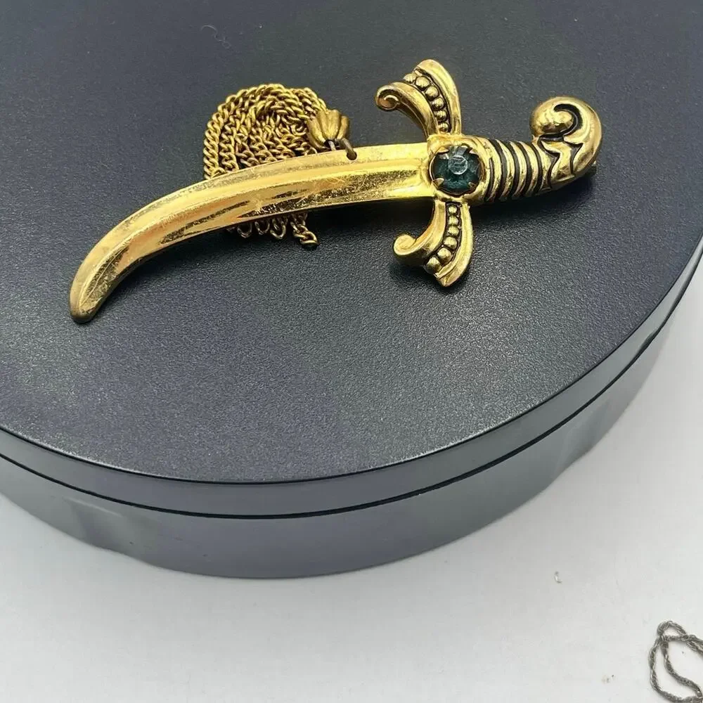 Coro Vintage Signed Gold‎ Tone Sword Dagger Brooch With Tassels and Green Stone