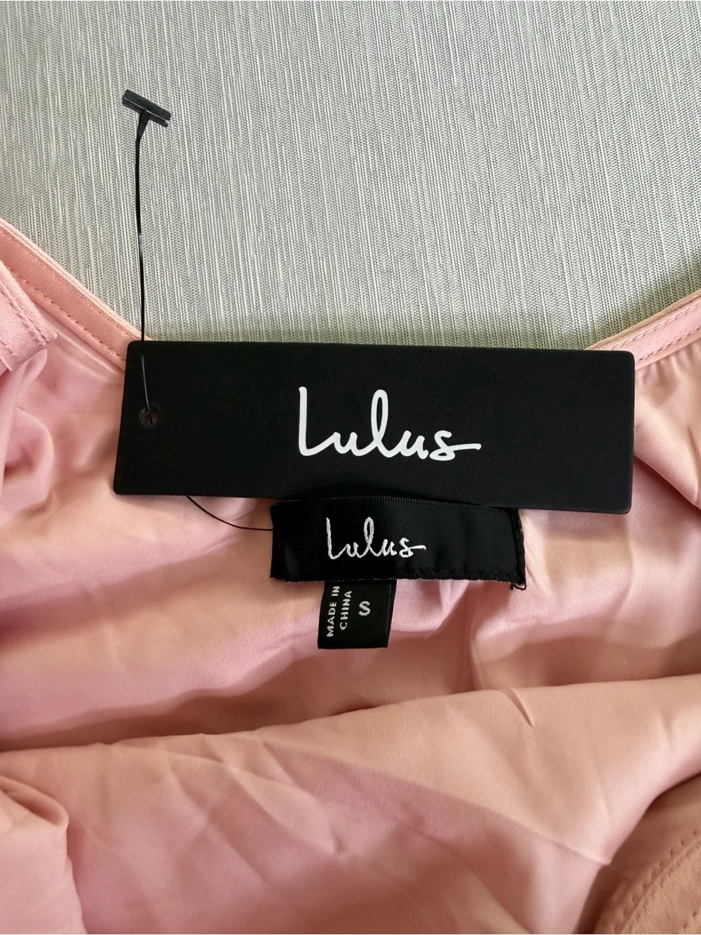 Lulus sits hem