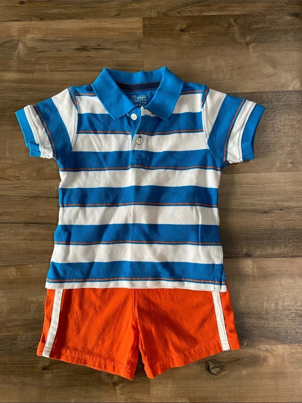 Blue & White Striped Polo with Orange Shorts