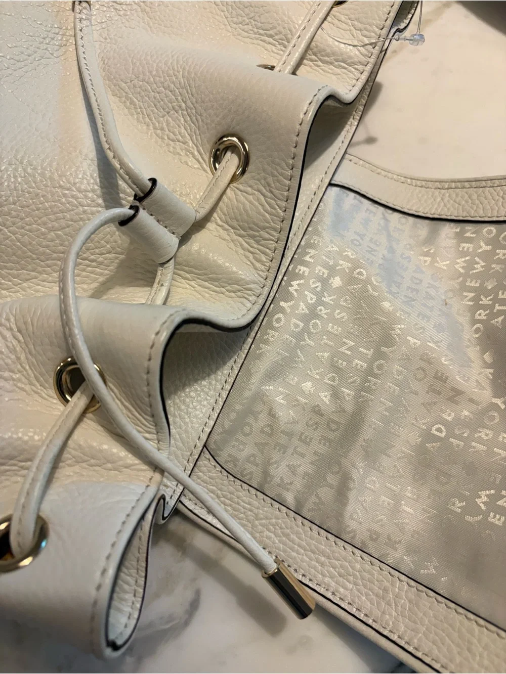 kate spade drawstring compact