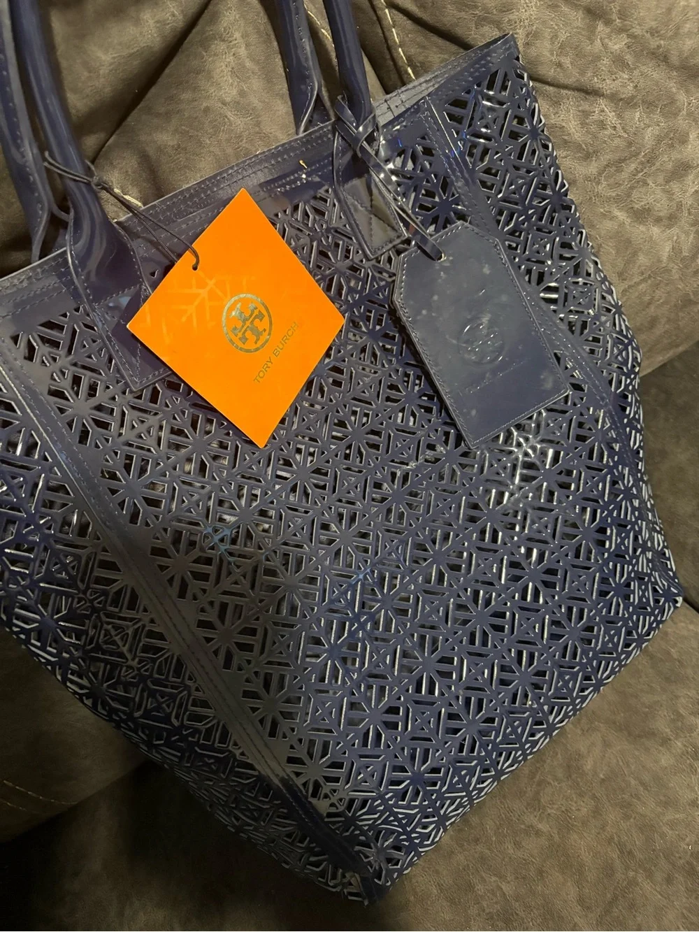 Tory Burch carrying everyday logo
