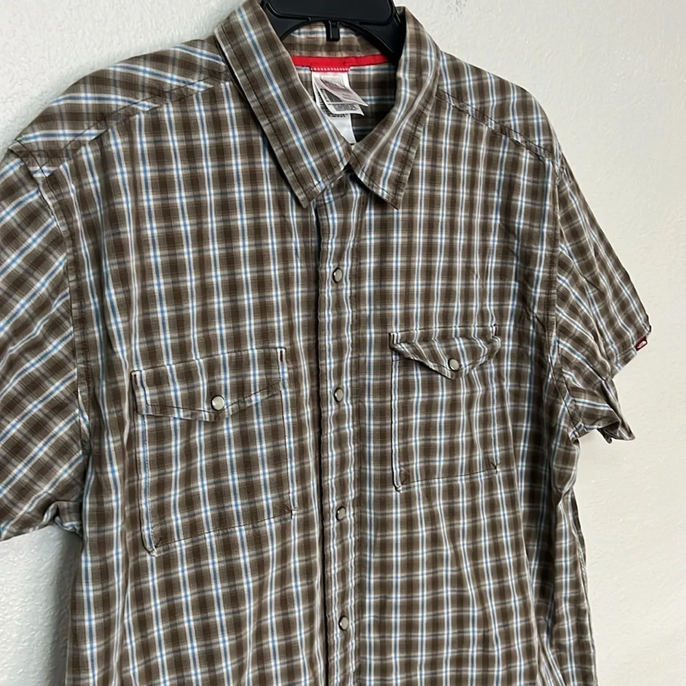 The North Face stains 23” pit