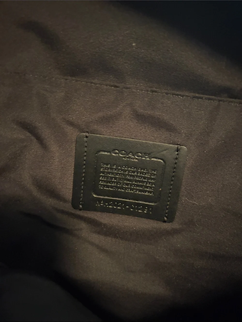 Coach sleek black