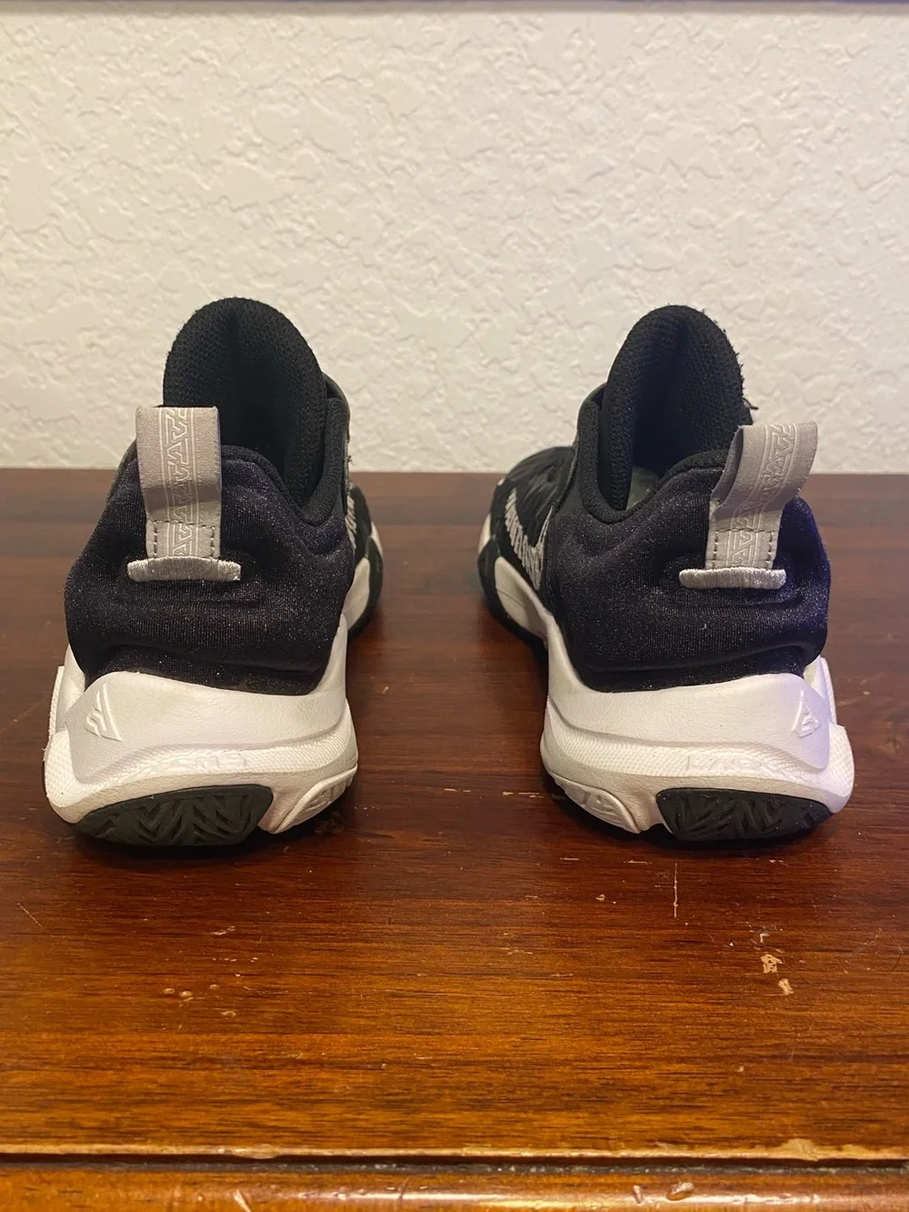 Nike Kids Black Sneakers with White Soles and Lime Accent
