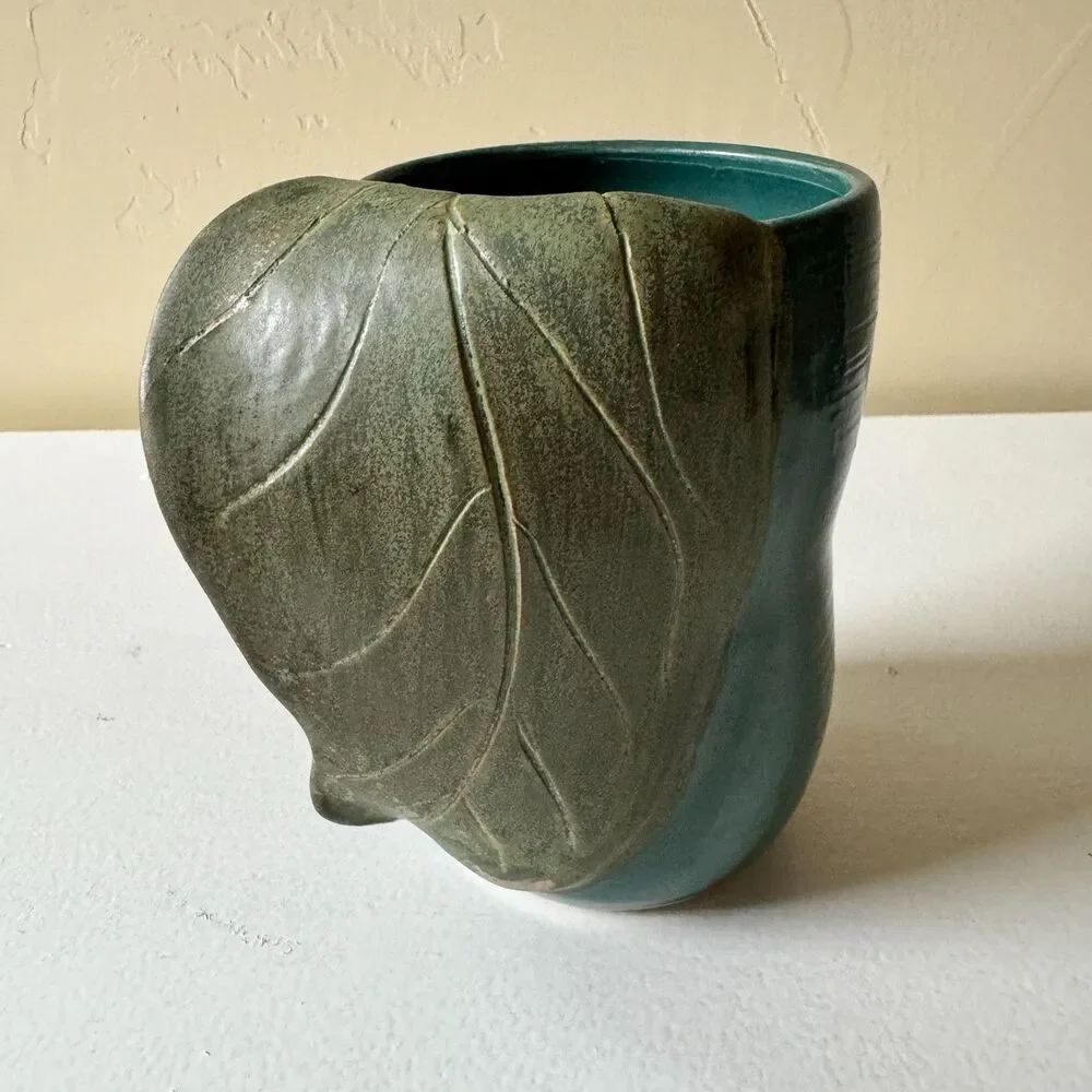 Source Unknown leaf handwarmer