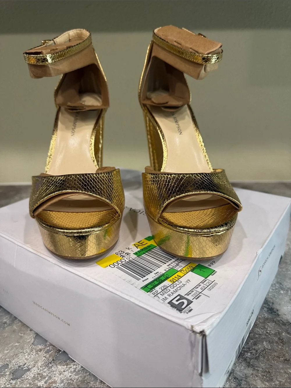 Jessica Simpson bold gold