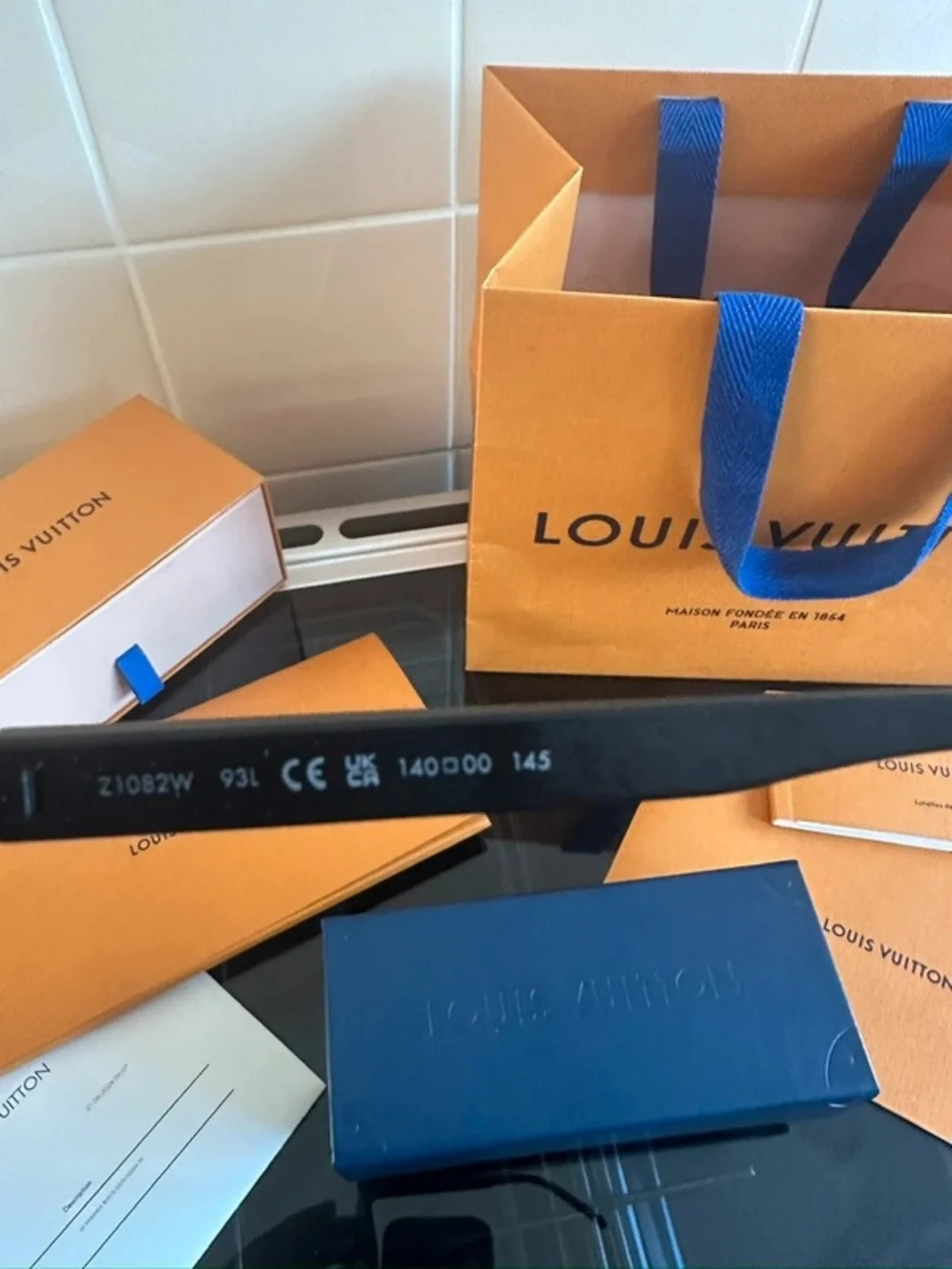 Louis Vuitton shield style