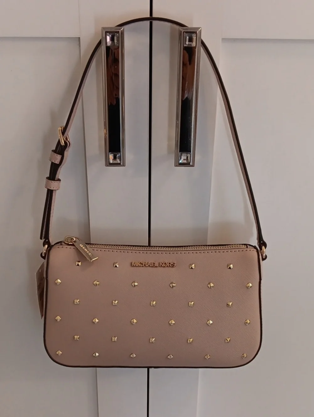 Michael Kors has blush zip
