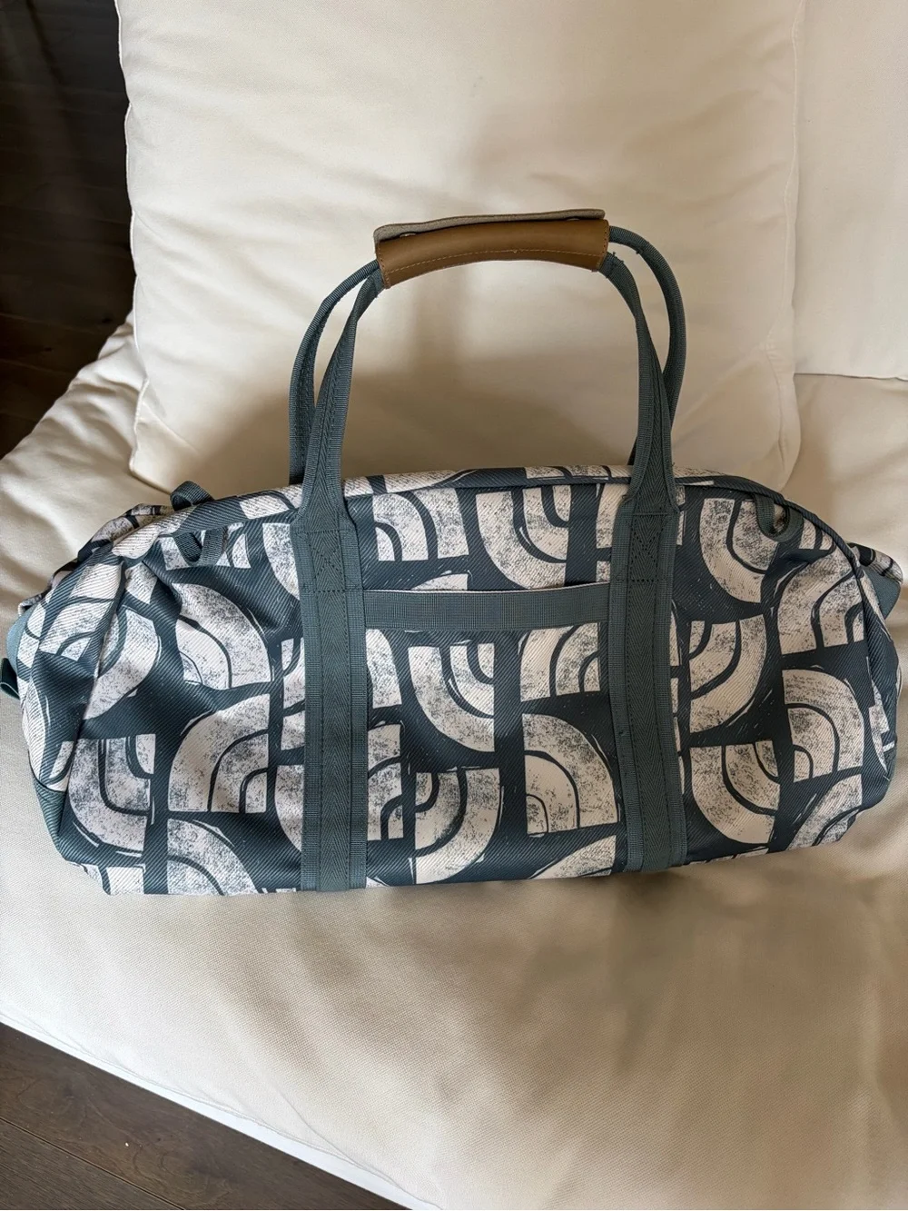 The North Face Teal and White Graphic Duffel Bag