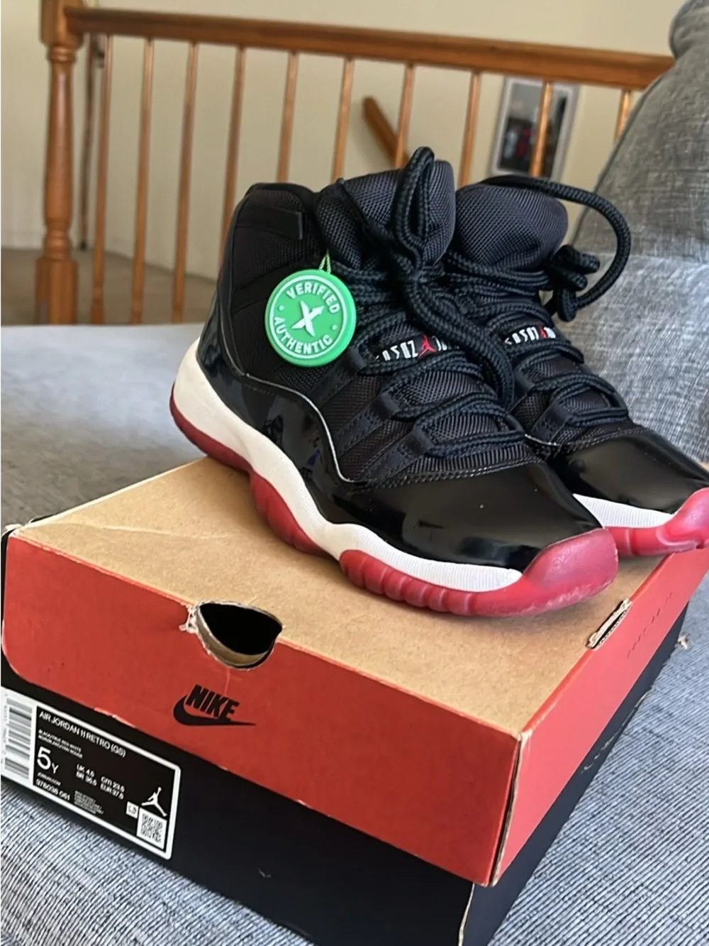 Nike Kids Black Sneakers with Red Soles