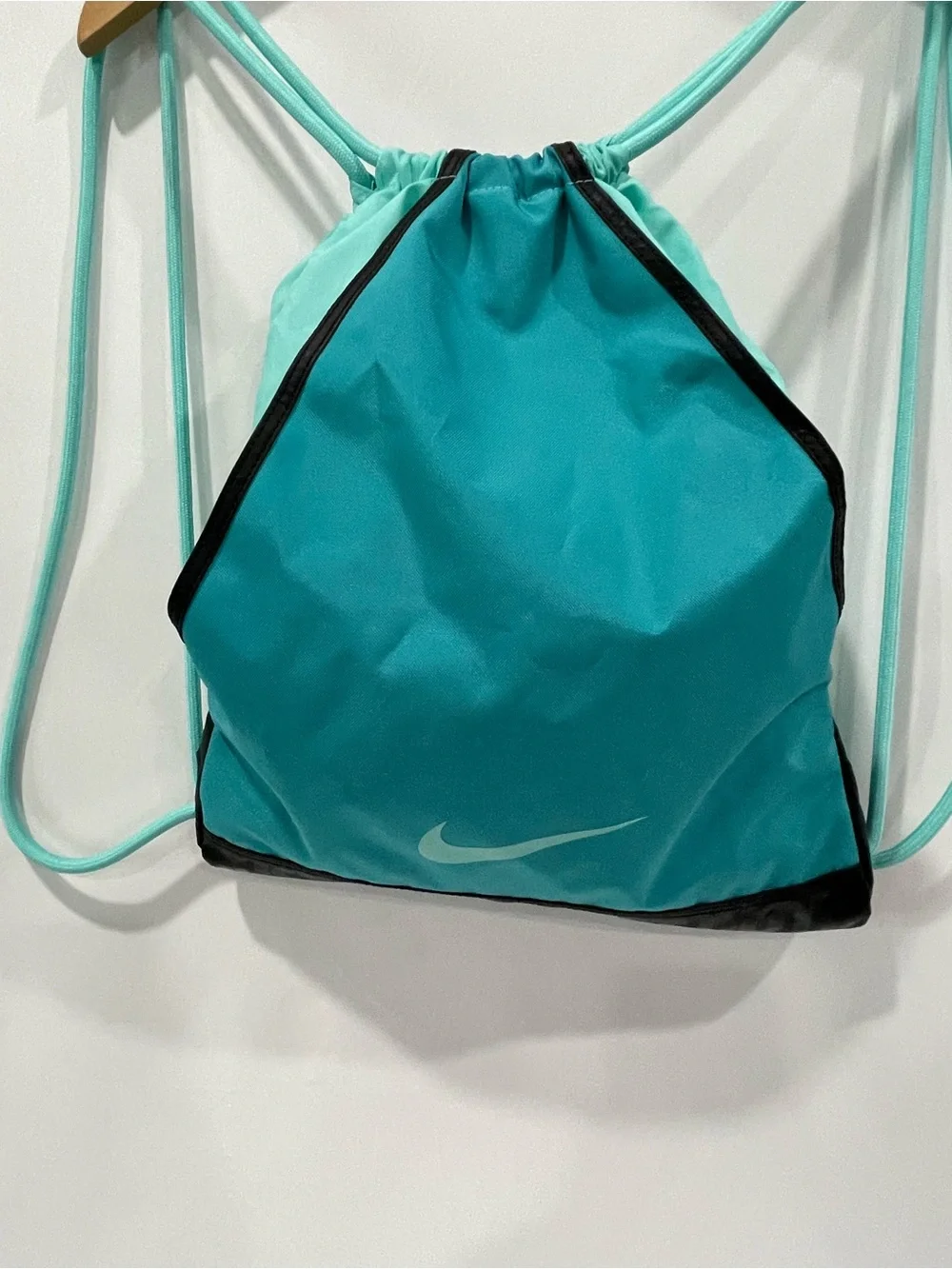 Nike aquamarine string