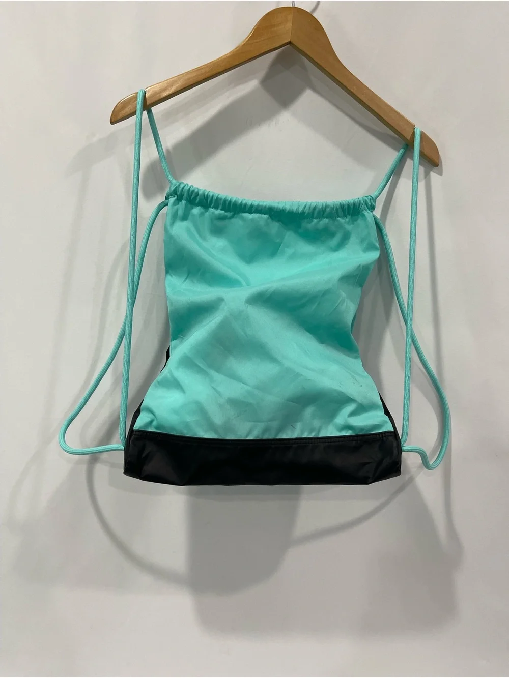 Nike aquamarine string