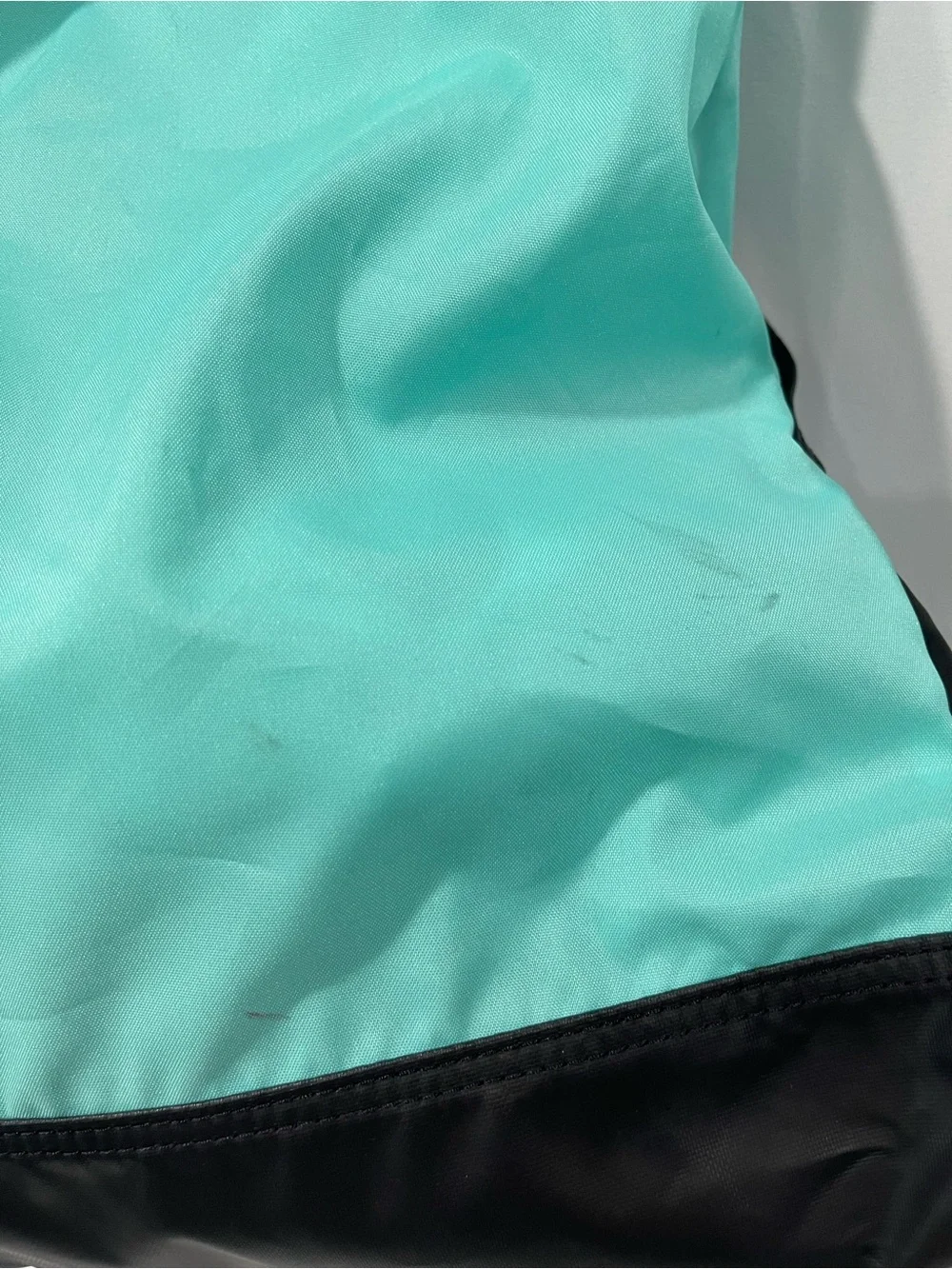Nike aquamarine string