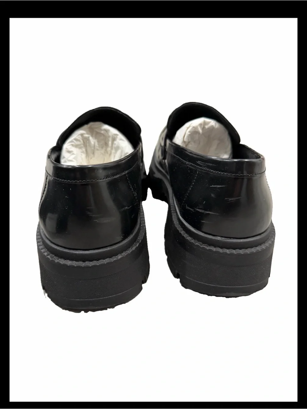 Coach polished black