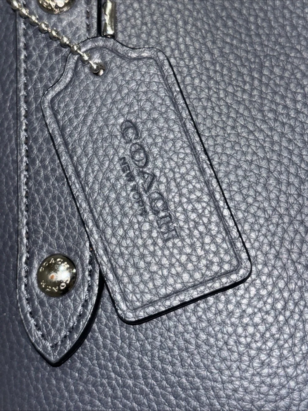 Coach authentic market