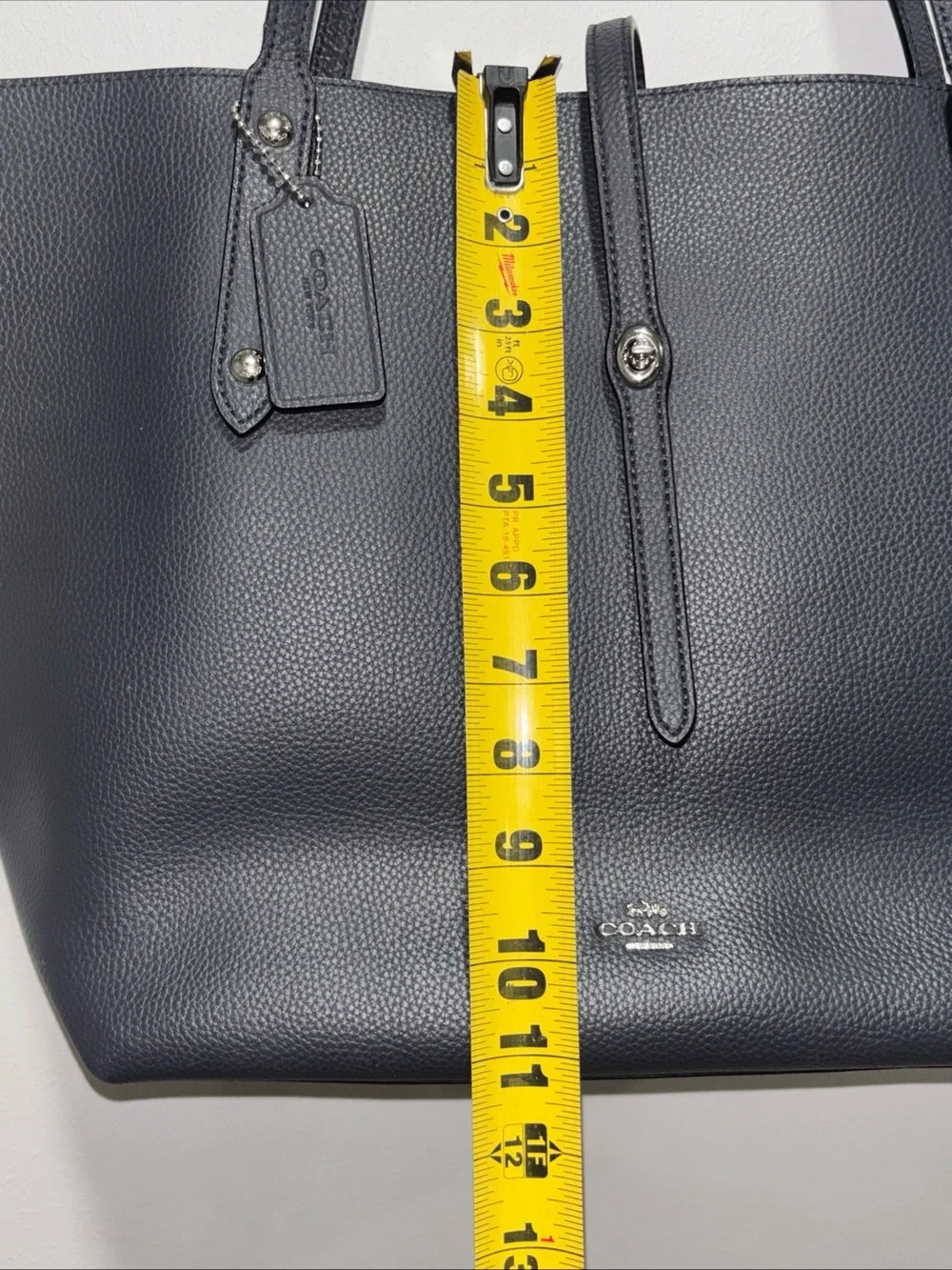 Coach authentic market