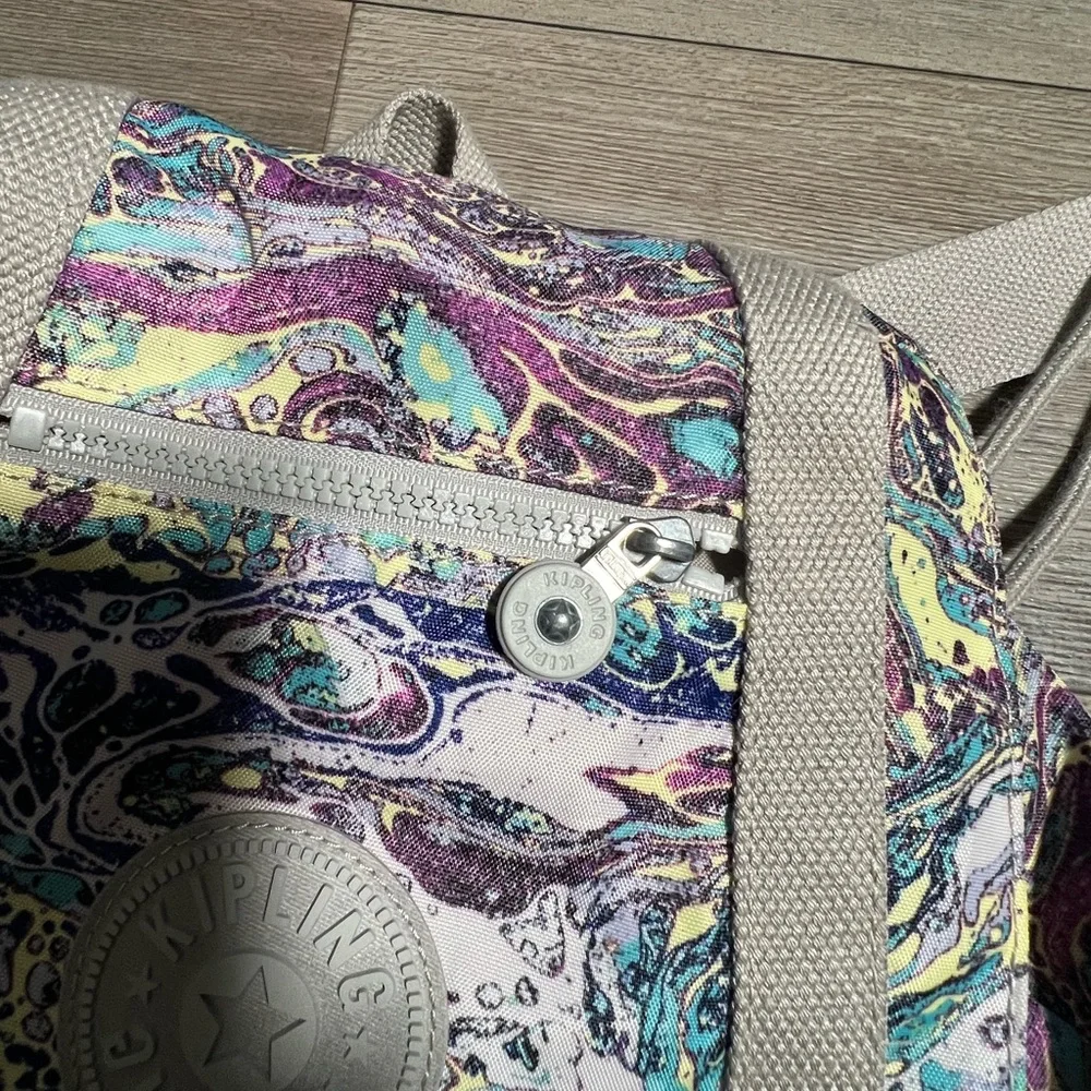 Kipling marble women