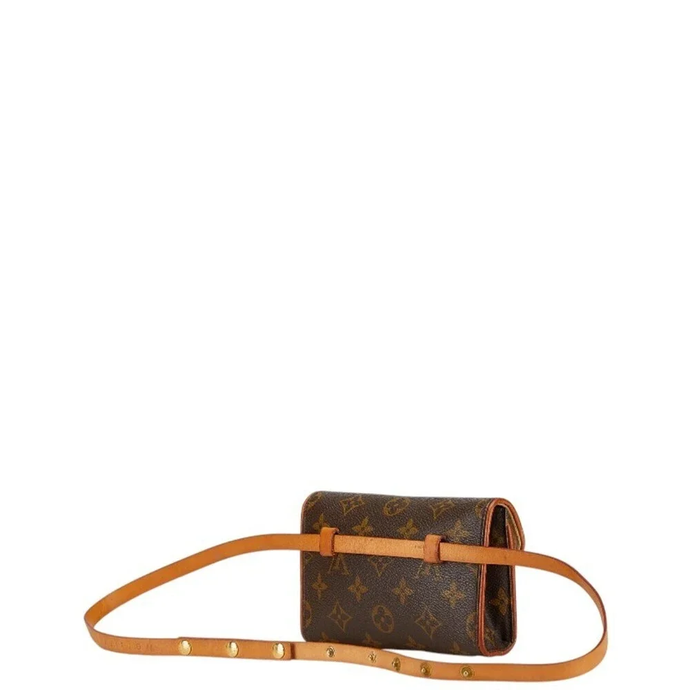 Louis Vuitton but usage marks