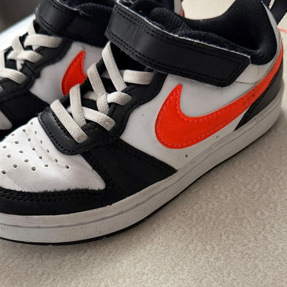 Nike Kids' Sneakers in Black, White, and Orange