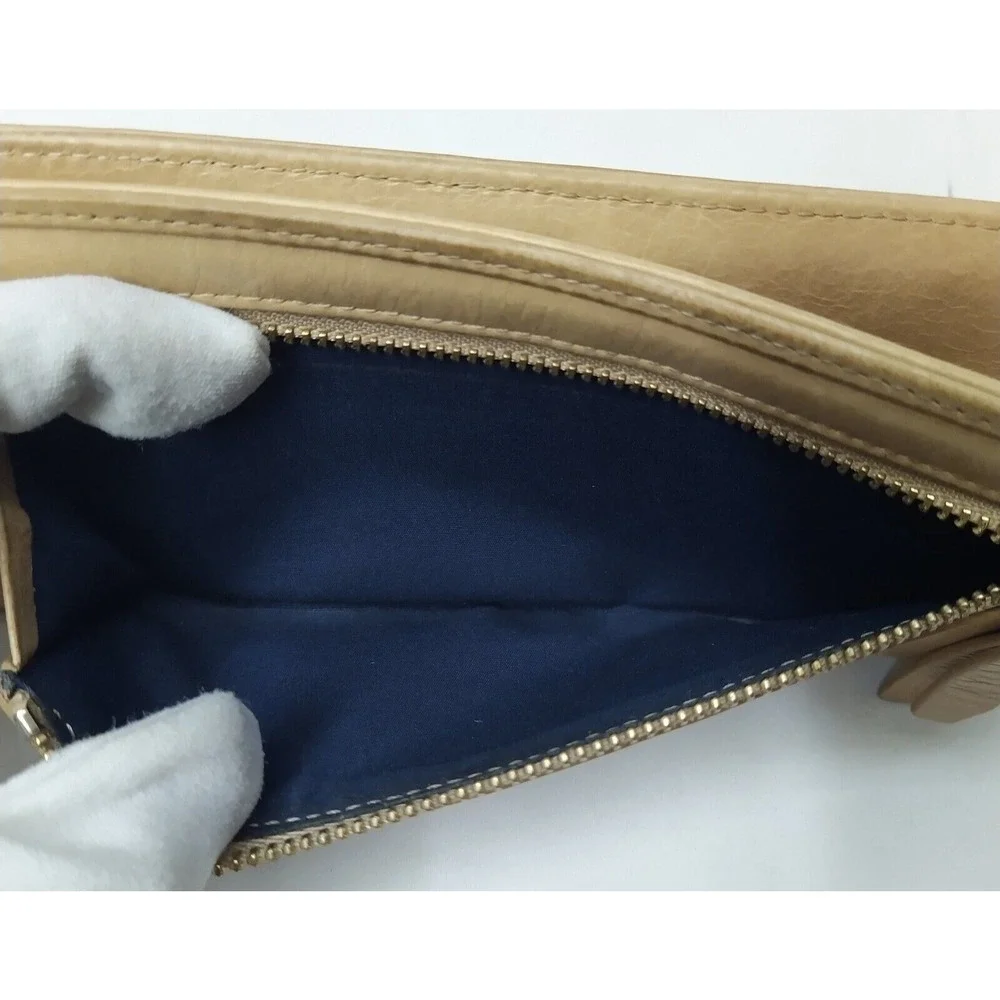 Cole Haan tear slots exterior