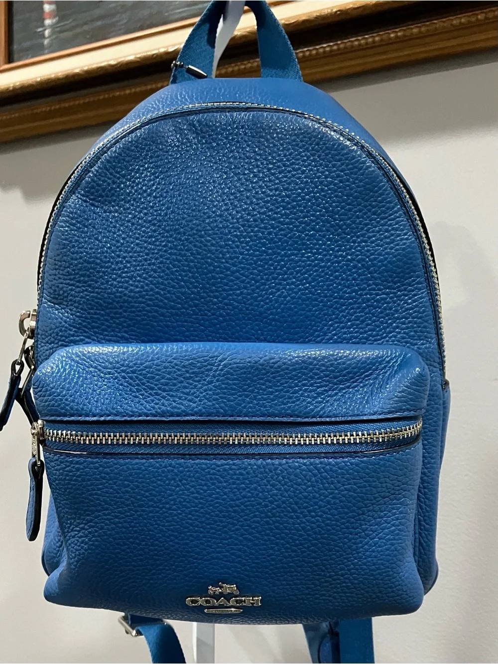 Coach compact pebbled