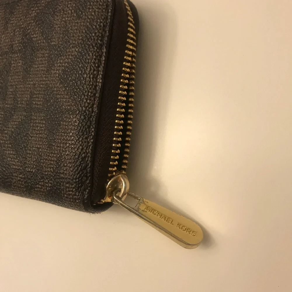 Michael Kors Black Logo Zip-Around Wallet with Gold Plaque