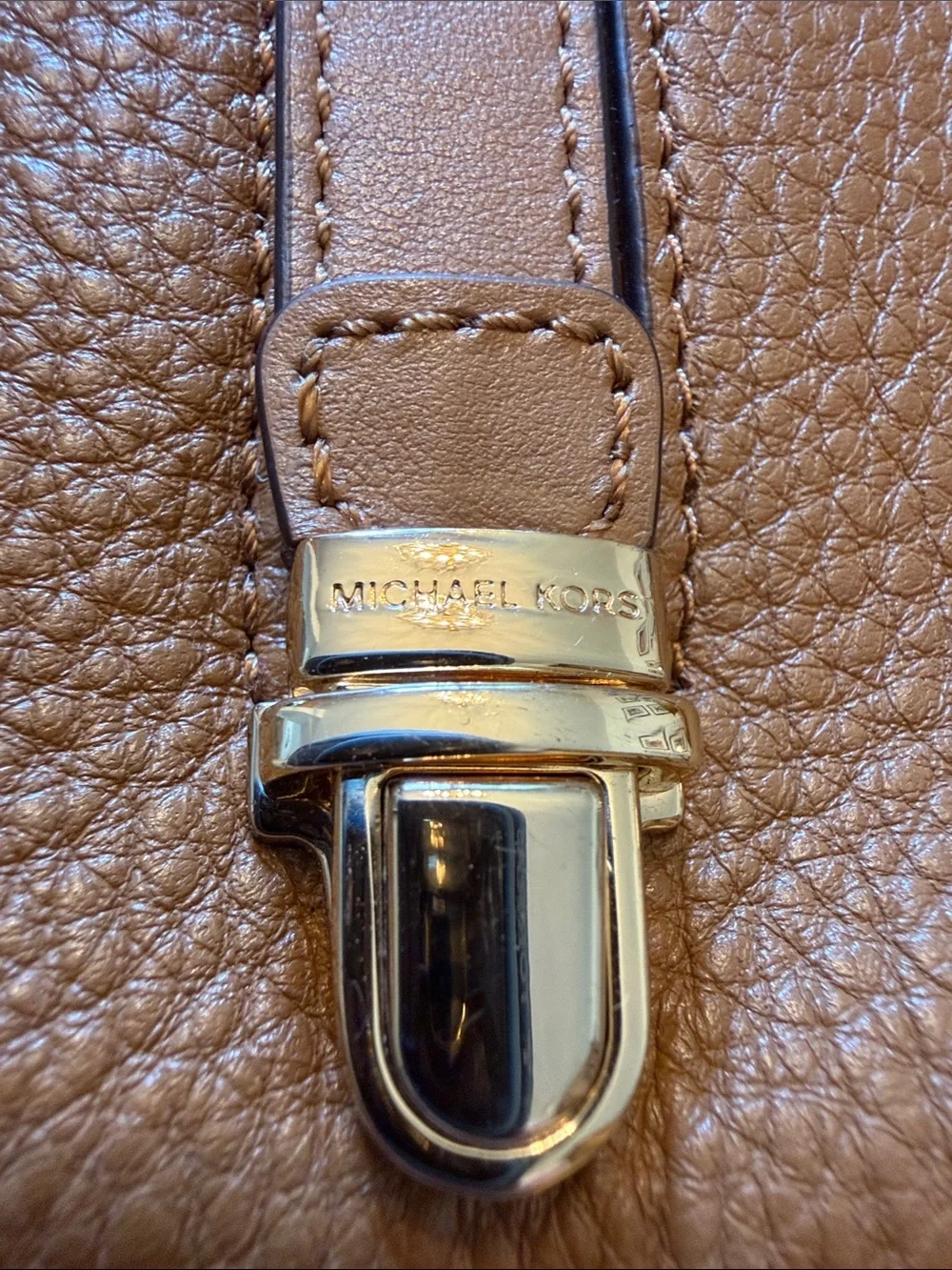 Michael Kors clutch gold