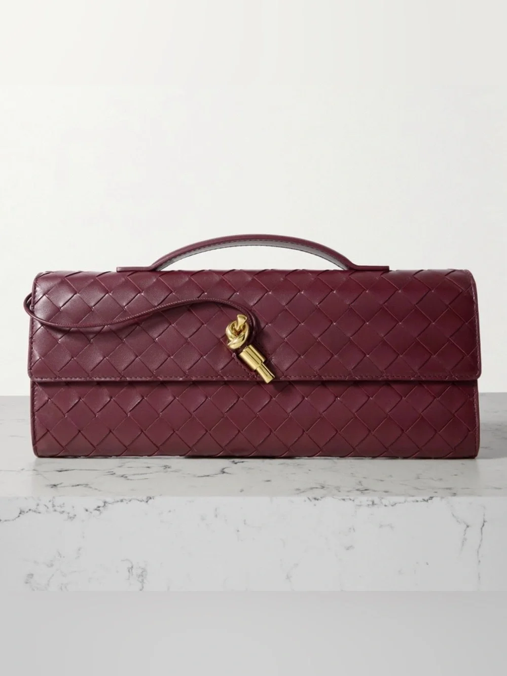 BOTTEGA VENETA Andiamo knot Intrecciato leather clutch