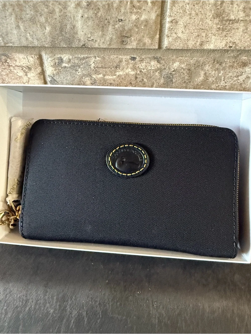 Dooney & Bourke Black Zip-Around Continental Wallet with Logo Patch