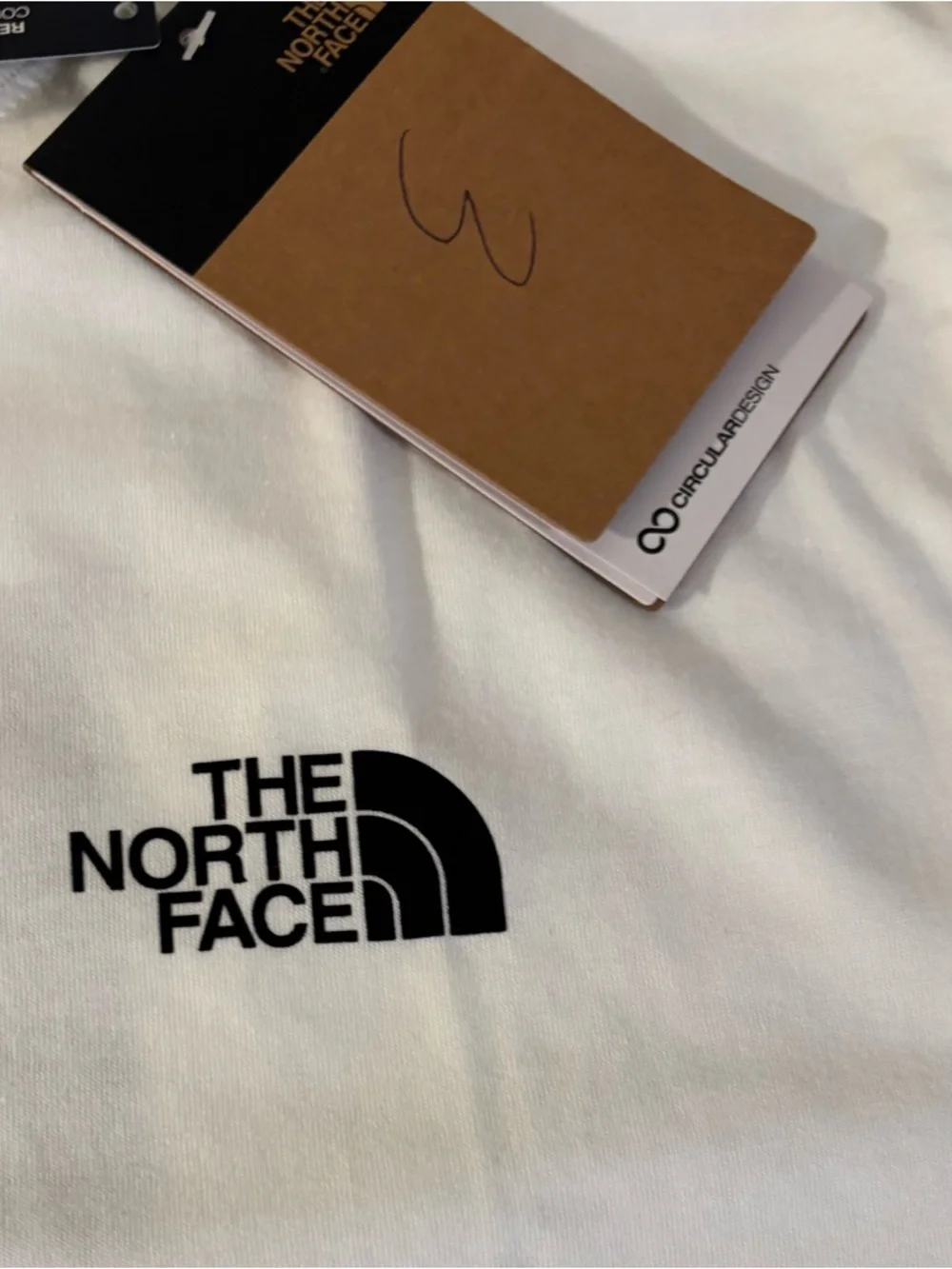The North Face White Tee with Black & Blue Camo Logo in Size L BNWT