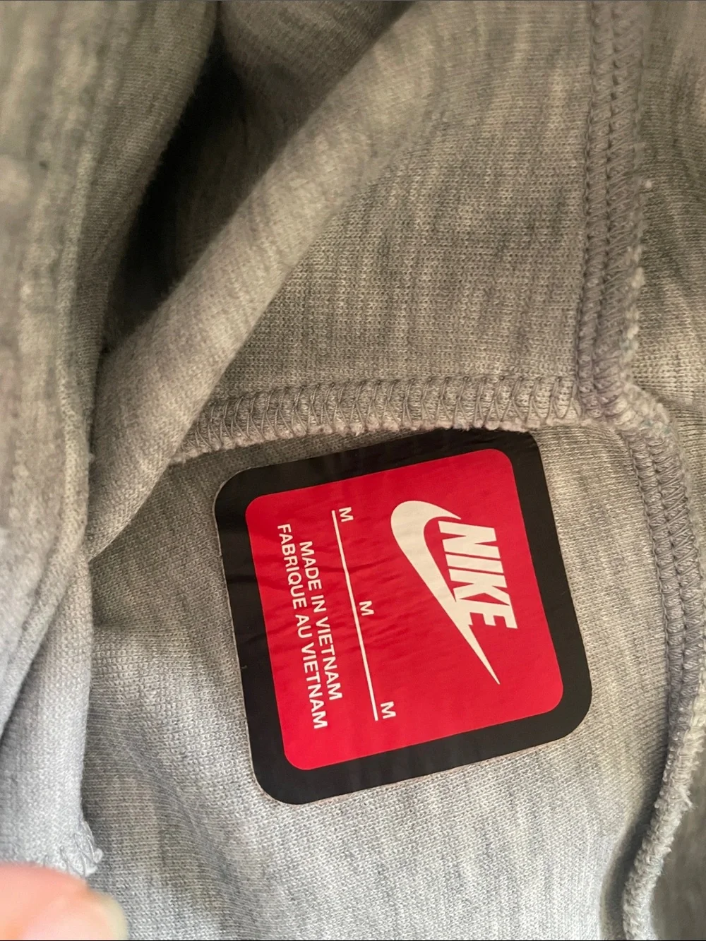 Big Boys Nike Tech Light Gray joggers with Red Tag
