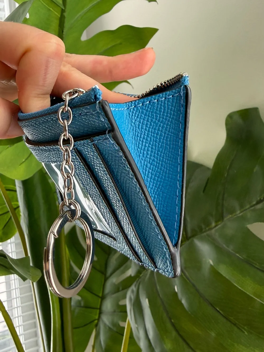 Coach sleek zip