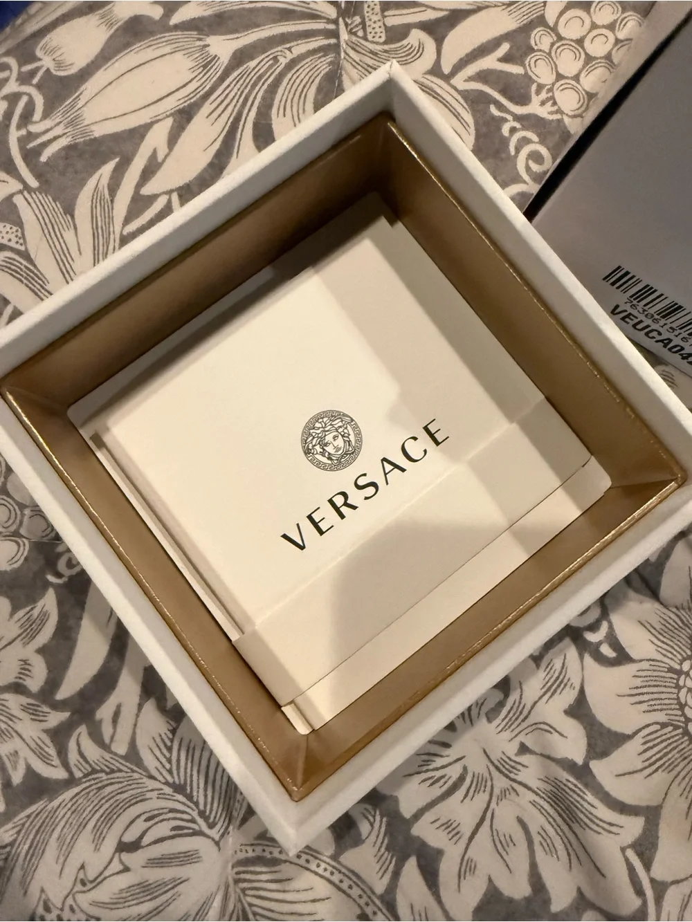 Versace toned crown