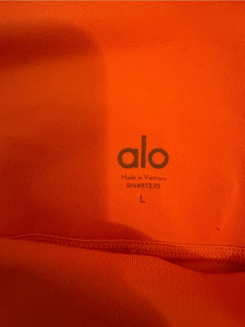 ALO Yoga vibrant orange