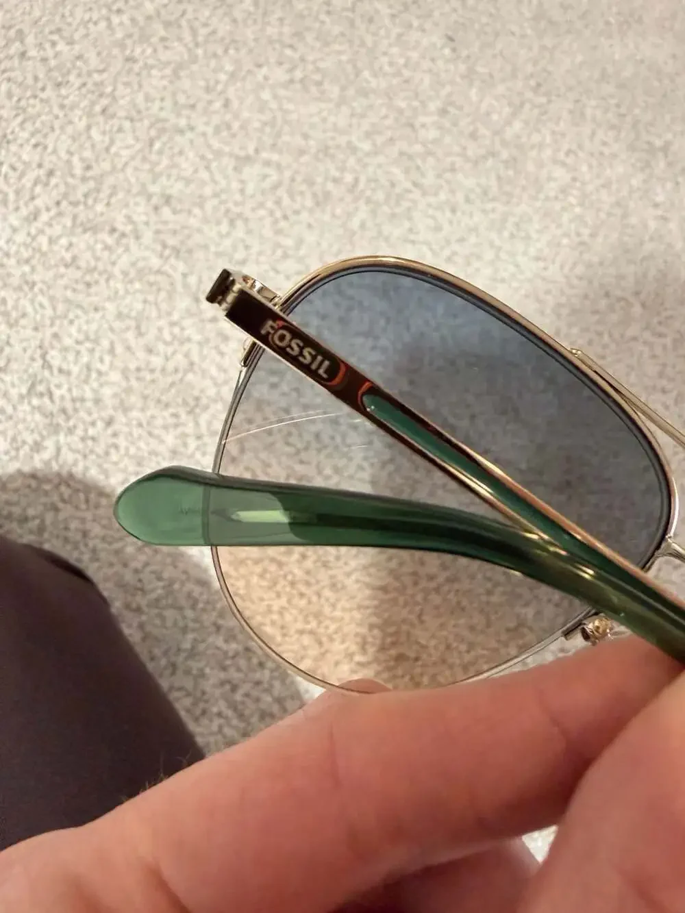 Fossil gold aviator