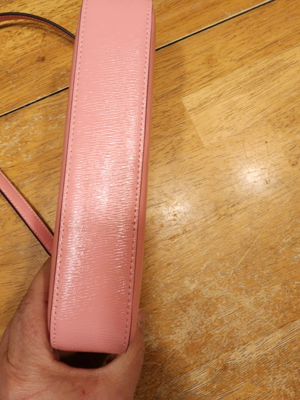 Kate Spade New York Gemini Convertible Wristlet in a pink color
